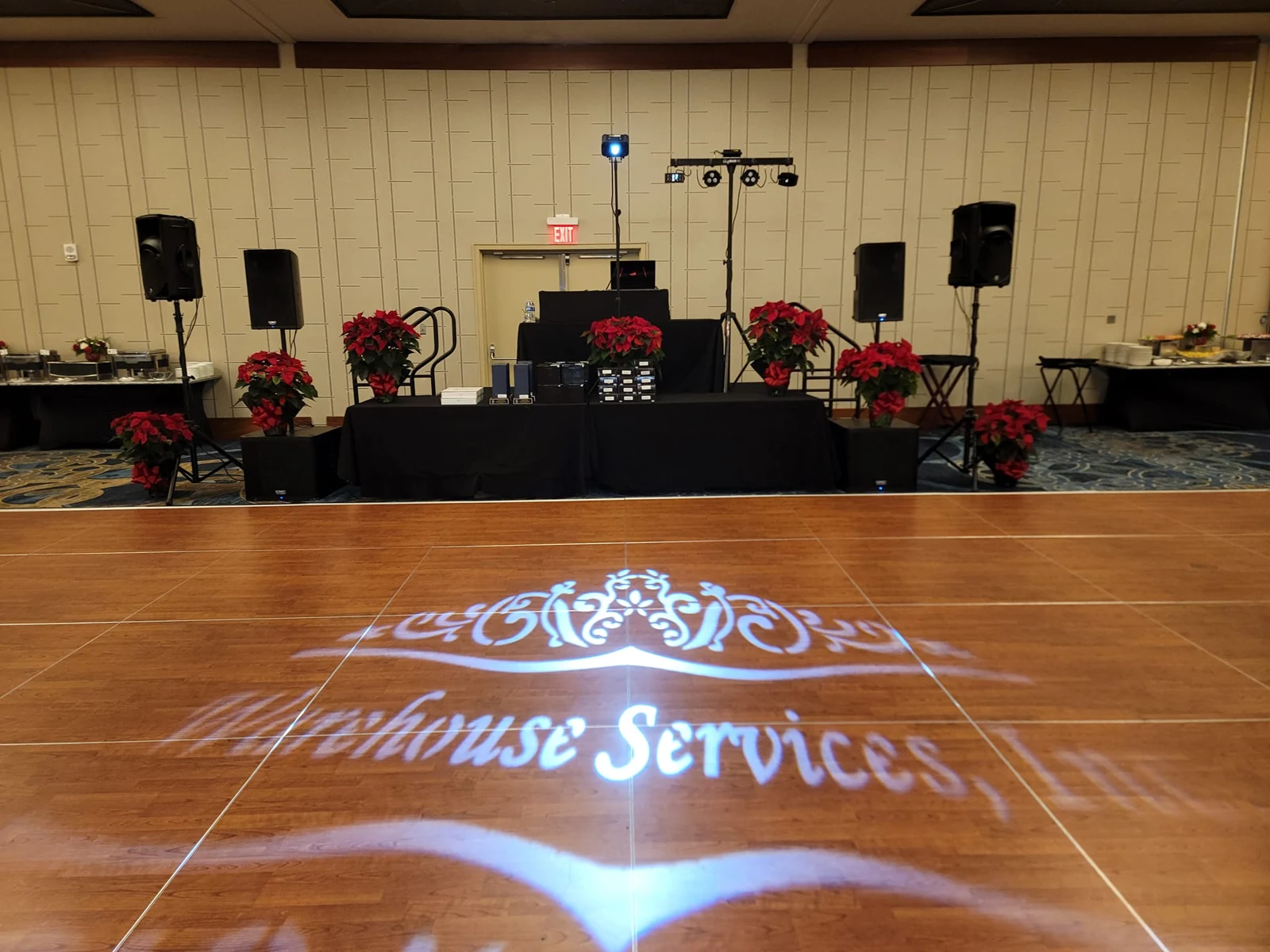 DJ sound and lighting setup at a company celebration