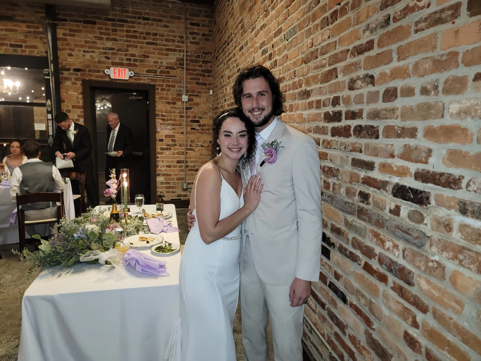 Newlyweds celebrating at their reception