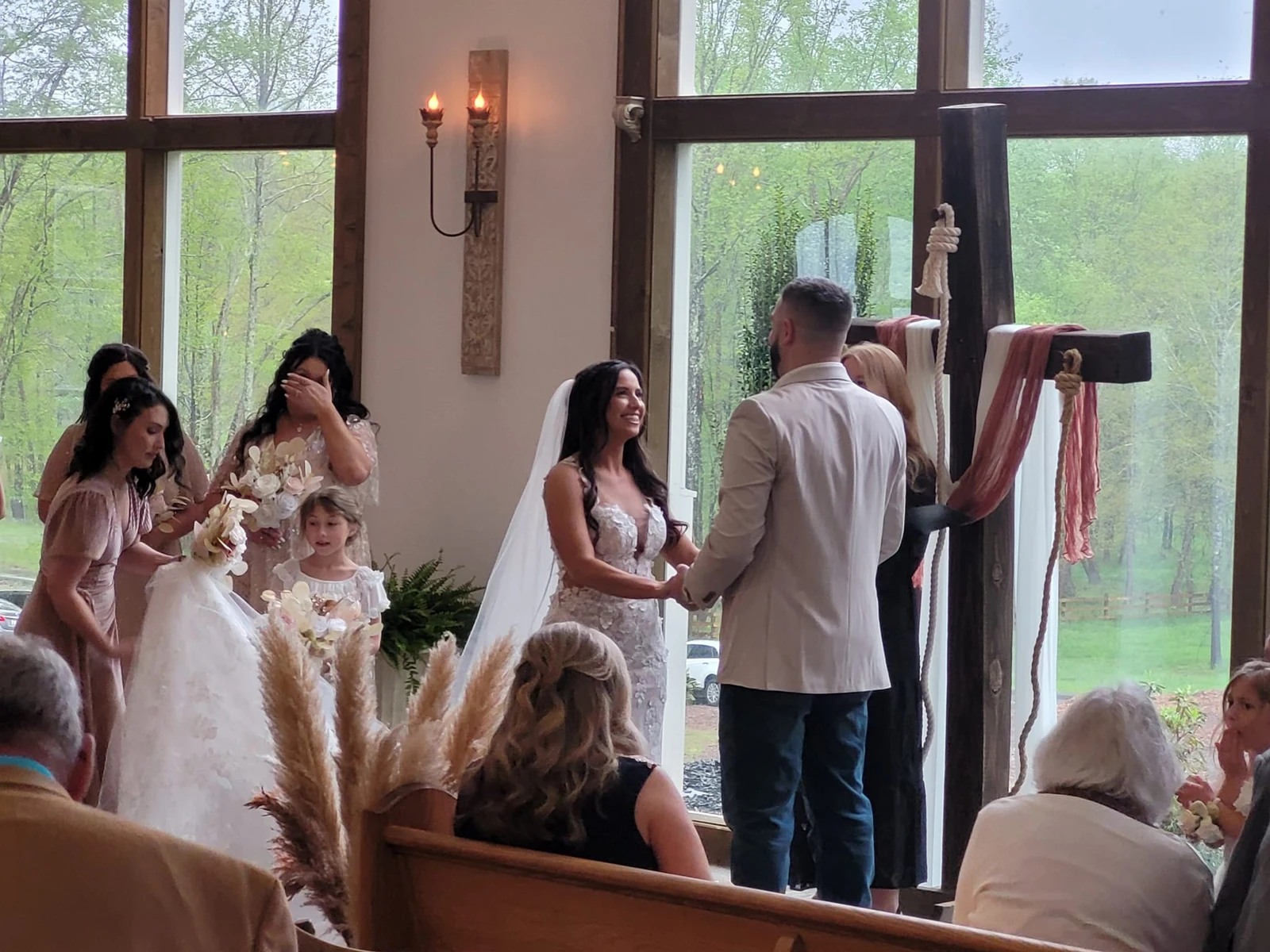 A wedding ceremony surrounded by family and friends